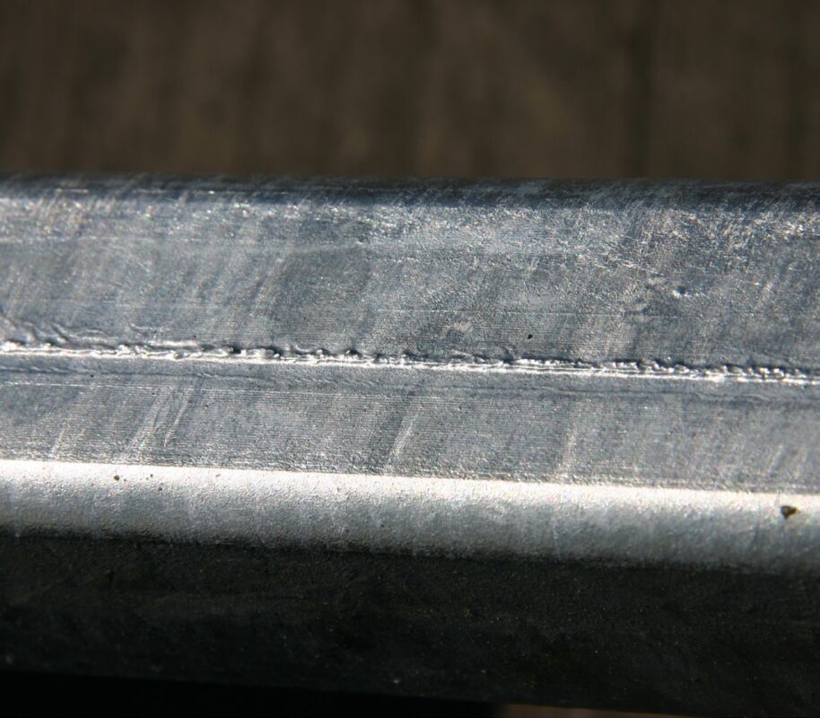Build up of the galvanized coating along the weld seam of a box section